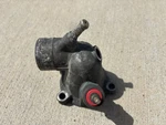 1172012130 Thermostat Housing M117 500SEC 500SEL 500SLC. Fixed Price $73.25.