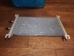 John Deere AT376261 Fuel Cooler. Fixed Price $200.00.