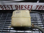Used Ford F250 Radiator Coolant Overflow Reservoir Tank Part F6TA-8A080-EA. Fixed Price $63.74.